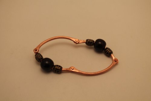 Judy Freyer Thompson's Articulated Copper Wire Bracelet - , Contemporary Wire Jewelry, How To Punch Holes, Hole Punching, Punch A Hole, Riveting, Riveting Techniques, Wire Rivets, finished bracelet